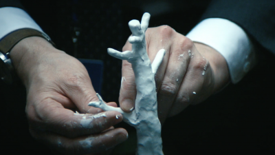 Mark sculpting a tree out of clay