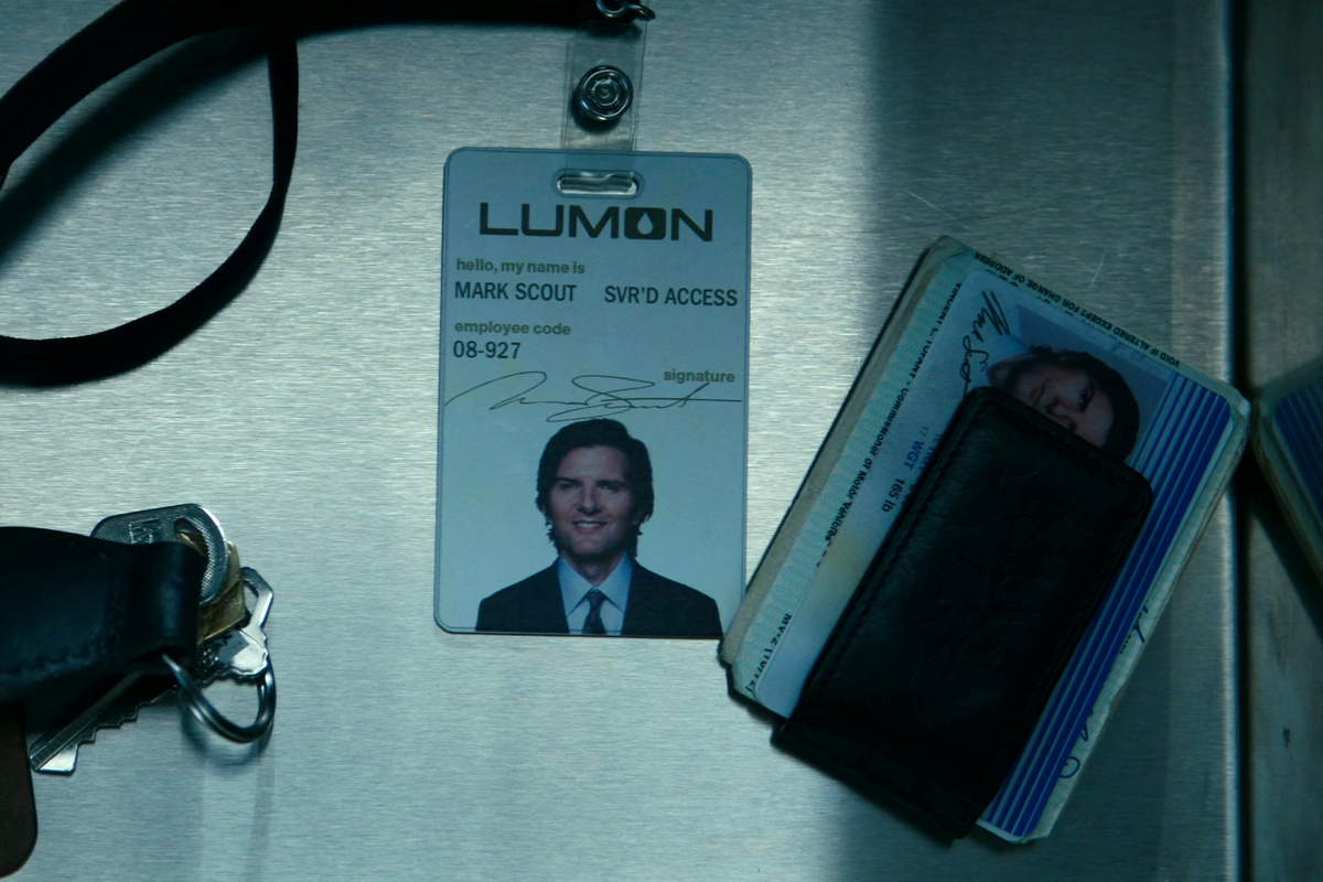 Mark’s ID badge and driver’s license