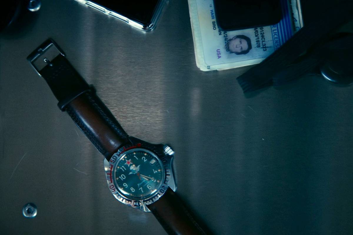 Mark swaps out his watch before heading to the elevator