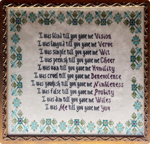 A framed needlepoint of the Lumon Principals